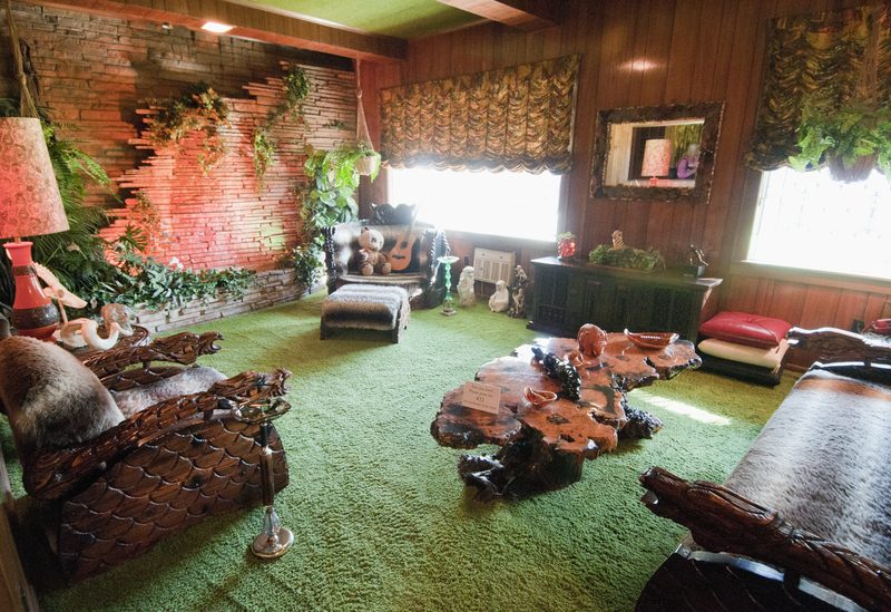 The Jungle Room at Graceland, with its green shag carpet and carved wooden furniture