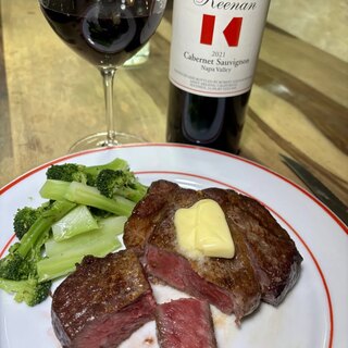 The plated steak with broccoli and the Keenan Cabernet