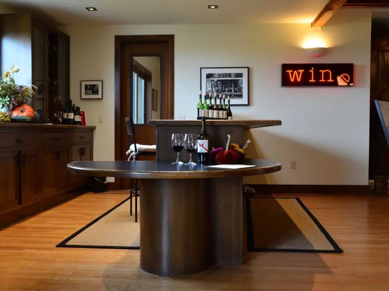 The ADA-compliant wine tasting bar at Keenan Winery, a rounded counter with clear floor space and knee clearance for wheelchair users