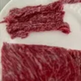 The raw sirloin flap, showing the marbling that lets the cut work uncooked