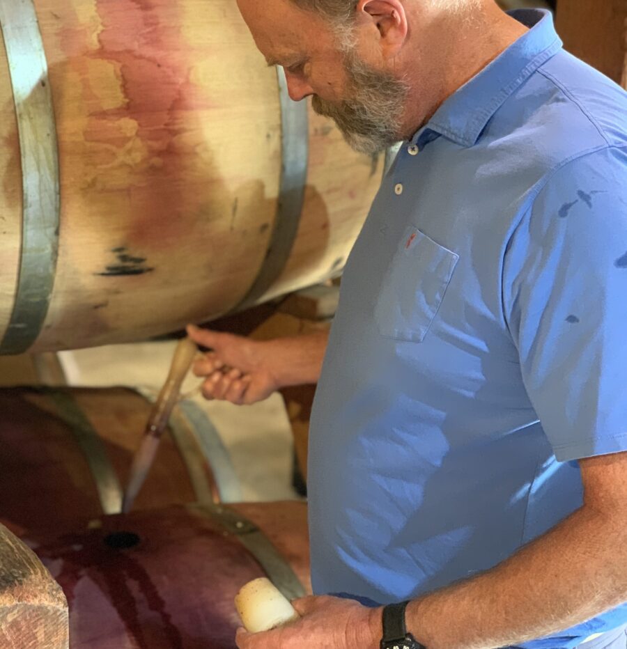 michael-keenan-tapping-a-wine-barrel
